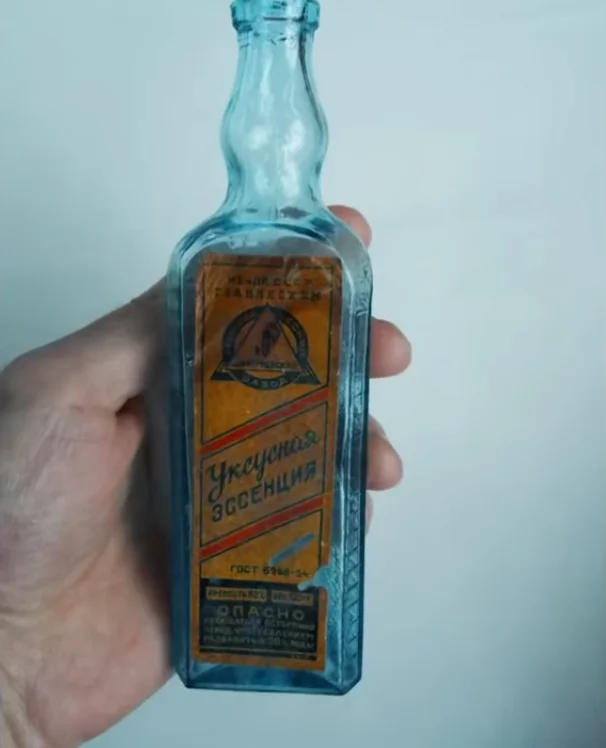 бутылка в руке